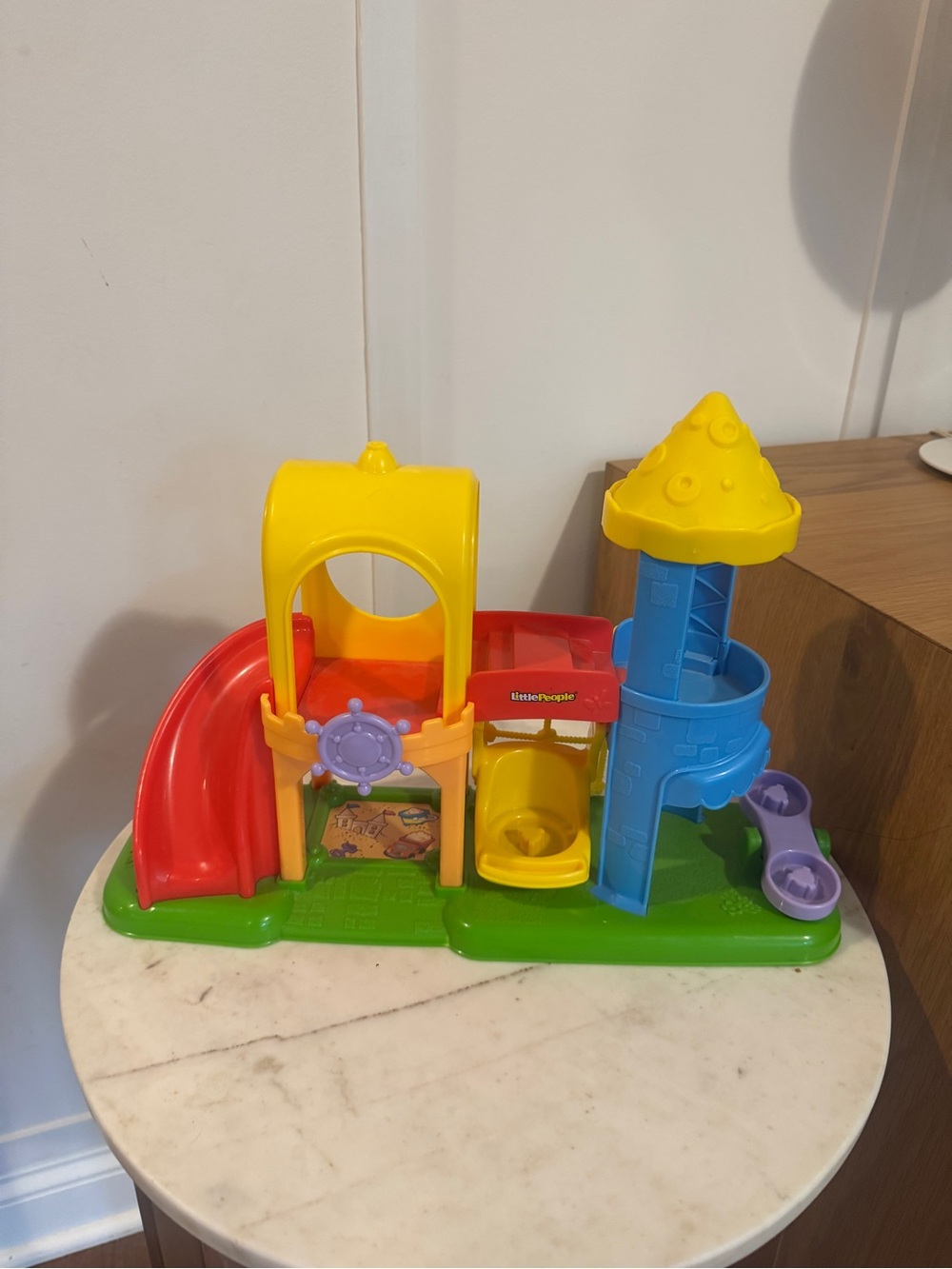 the Fisher-Price Little People Neighborhood Playground from 2012